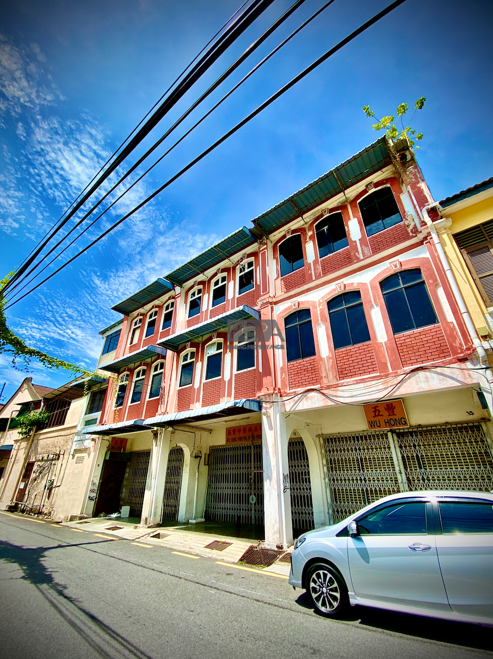 Adjoining 3-Storey Heritage Shophouses on Muntri Street in George Town World Heritage Site.