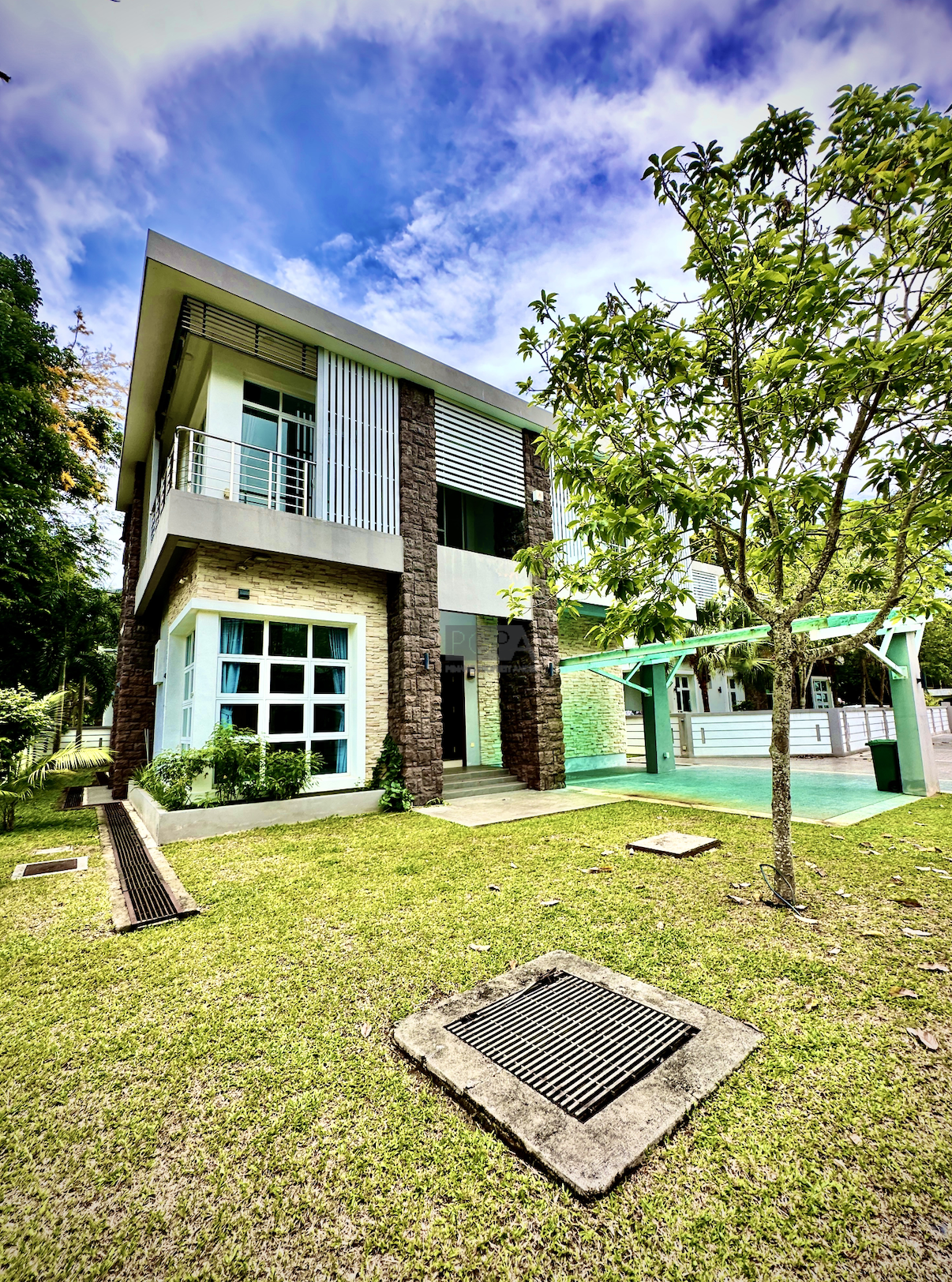 A Double-Storey Bungalow in Jesselton Heights.